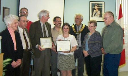 Myrtle McKendry, Murray Inch, Hank Jones, Robert McKendry, Lester McInnis, Kim McInnis,
Mayor Claude Cousineau of North Dundas Township, Marion Bartholomew and Gord Bartholomew